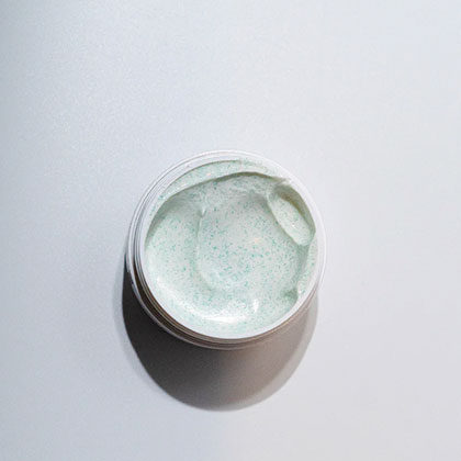 Dr. Louie Exfoliating Cleansing Cream 3.5oz. Image of cream texture.